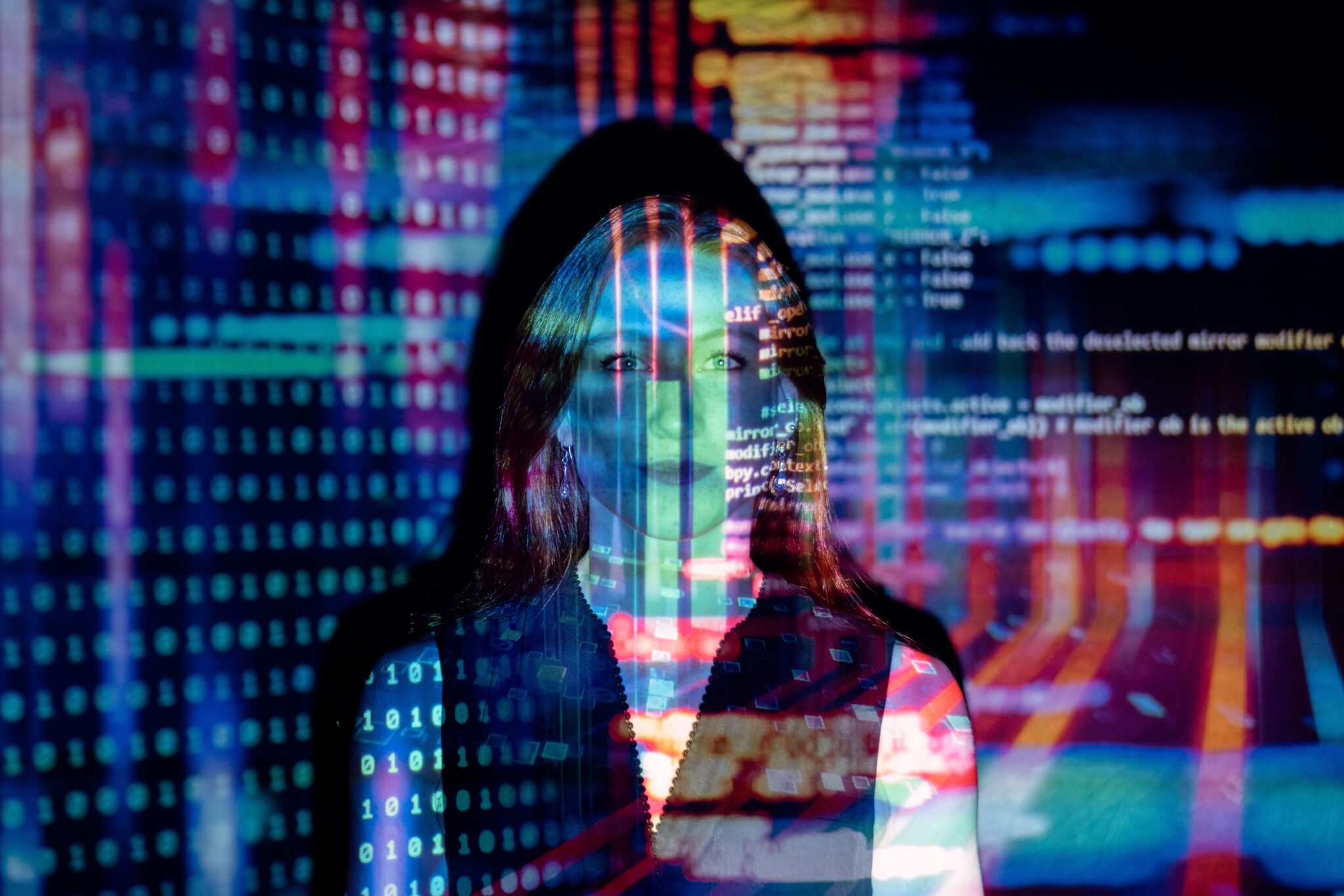 Image of woman with code projected on her