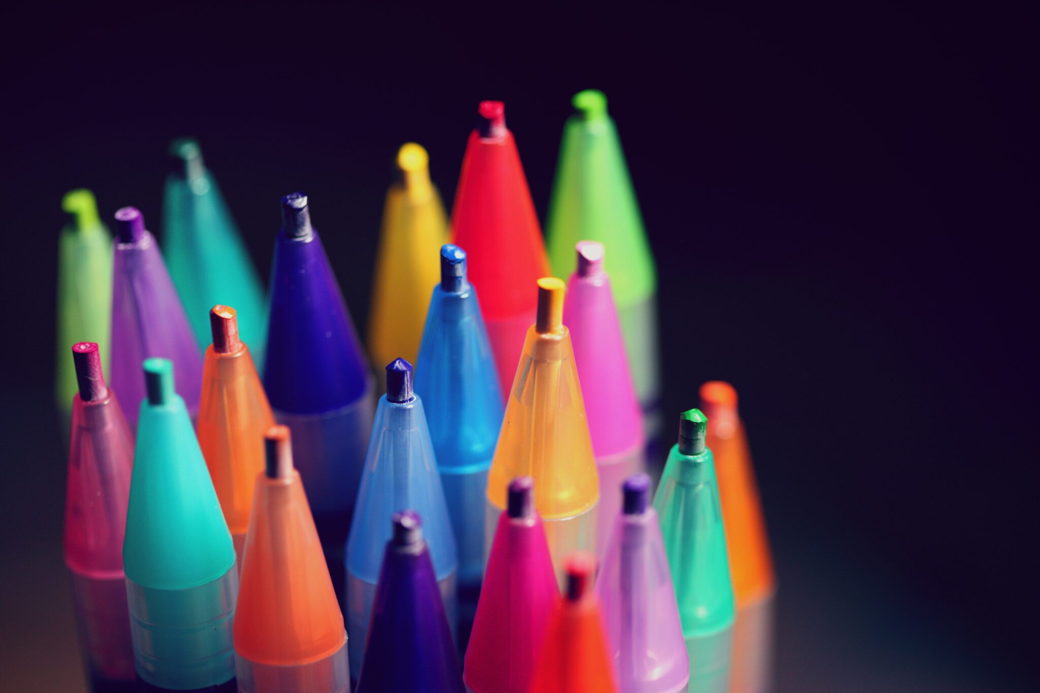 Close-up of colorful pencils with black background