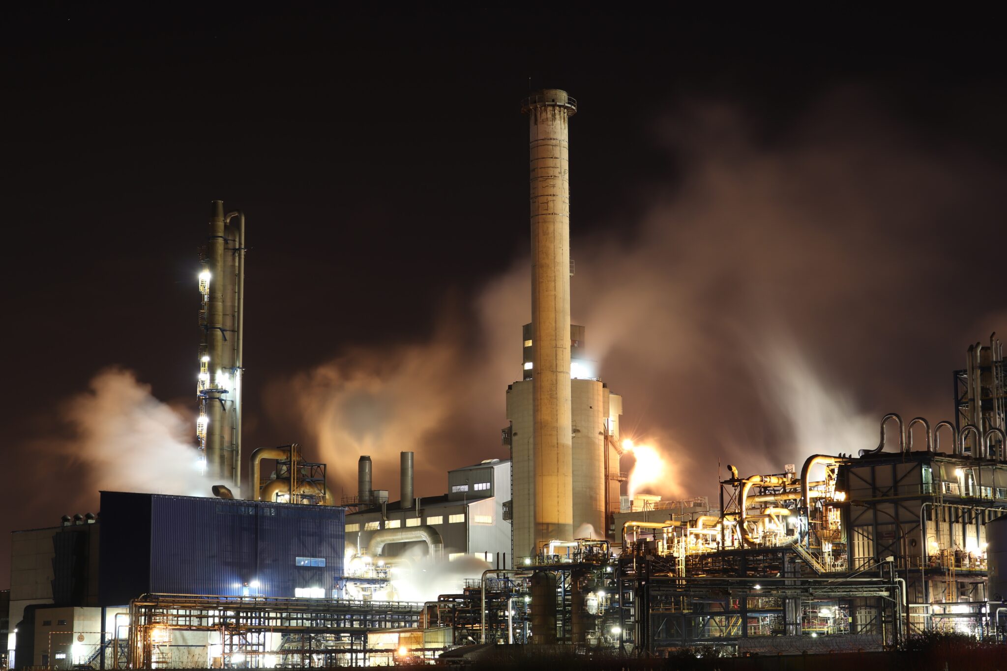 Image of large factory at night