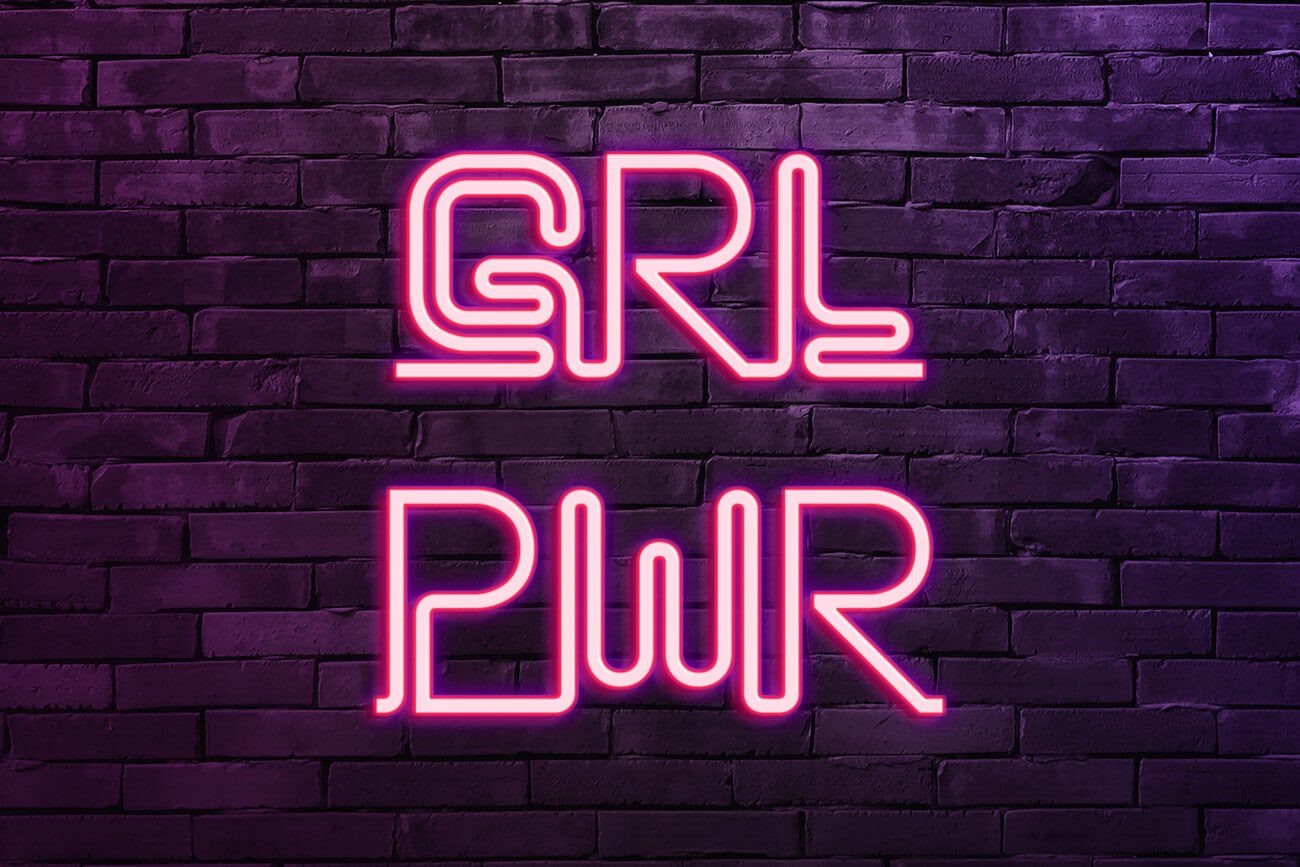Pink neon sign that says Girl Power.